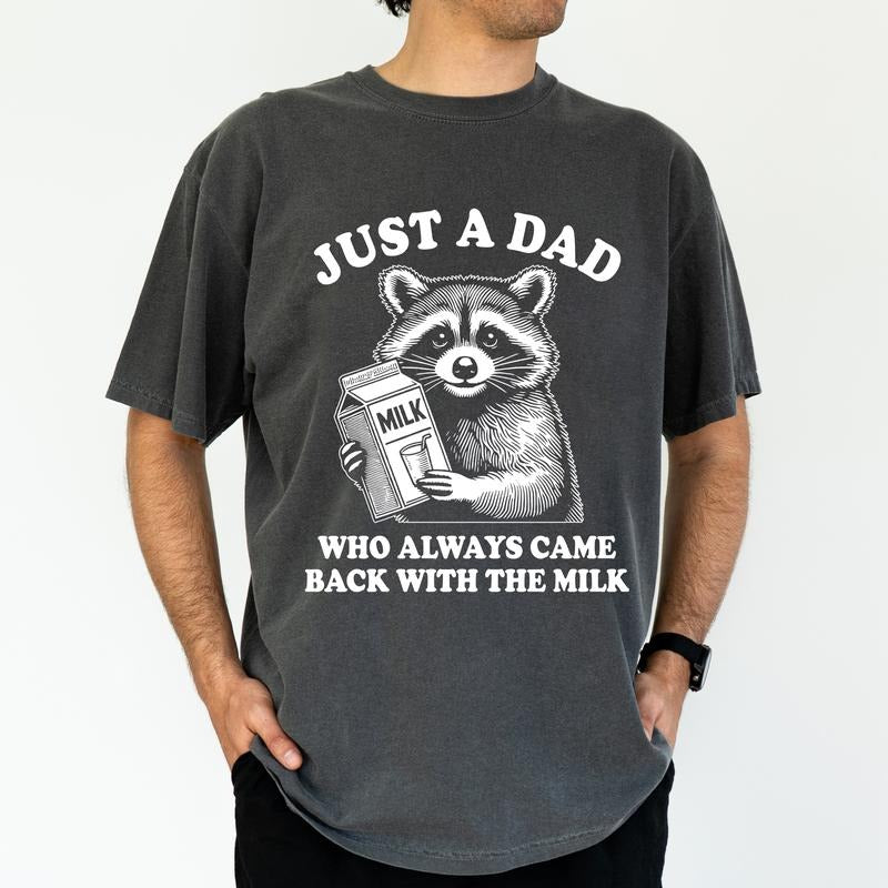 ChicCotton Just A Dad Who Always Came Back With The Milk Comfort Colors Graphic Tee, Funny Meme Raccoon Daddy T-shirt For...