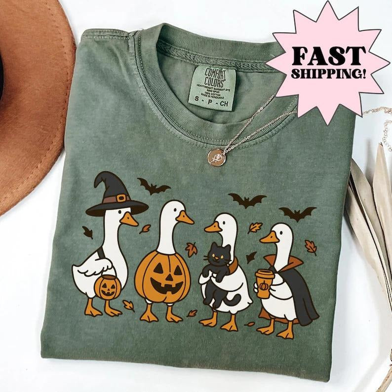 Comfort Colors Halloween shirt featuring a silly goose and spooky ghost design. Perfect fall pumpkin costume tee for fun,...