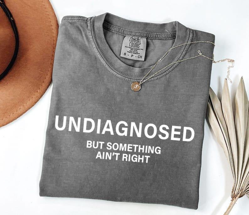Comfort Colors Undiagnosed But Something Aint Right Shirt, Funny Feminist Tee, Stylish Cotton Shirt for Men or Women,...