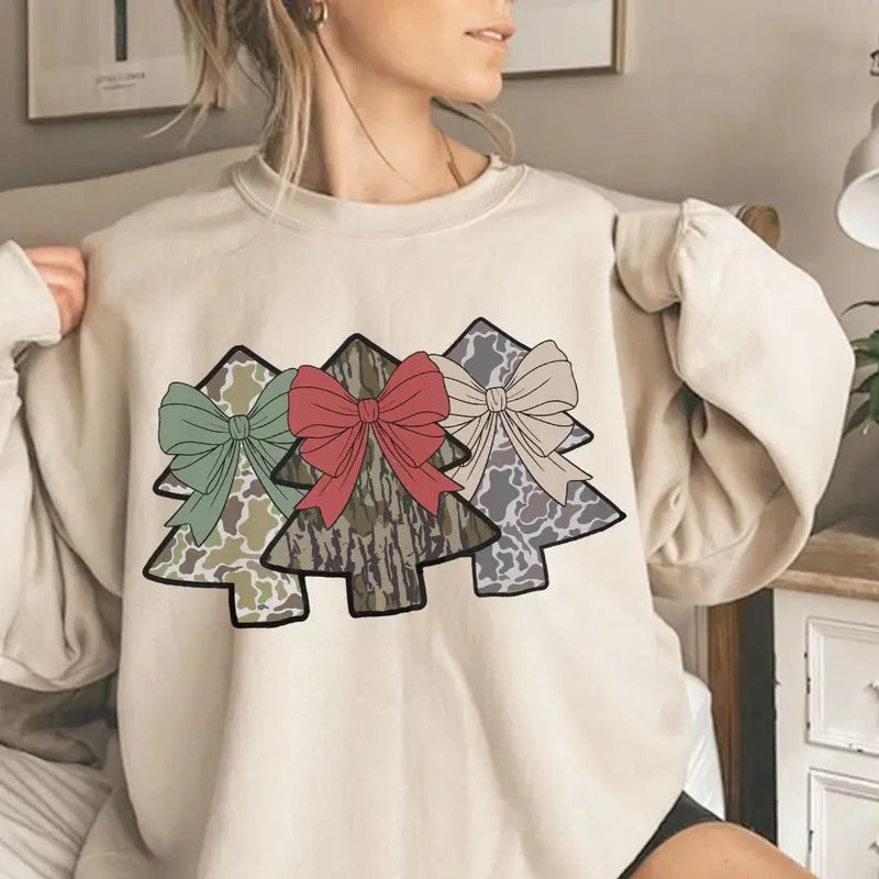 Coquette Bow Camo Christmas Trees Hunting Crewneck Sweatshirt, Retro Camo Bottomland Shirt Hoodie | HypeDripTees.com