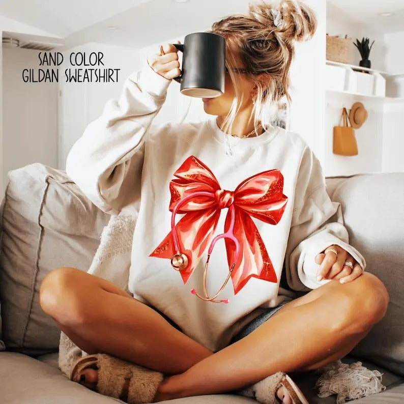 Coquette Nurse Stethoscope Bow Sweatshirt, Nurse Bow Shirt, Nurse Gift For Christmas, Coquette Nurse Shirt, Unisex Shirt,...