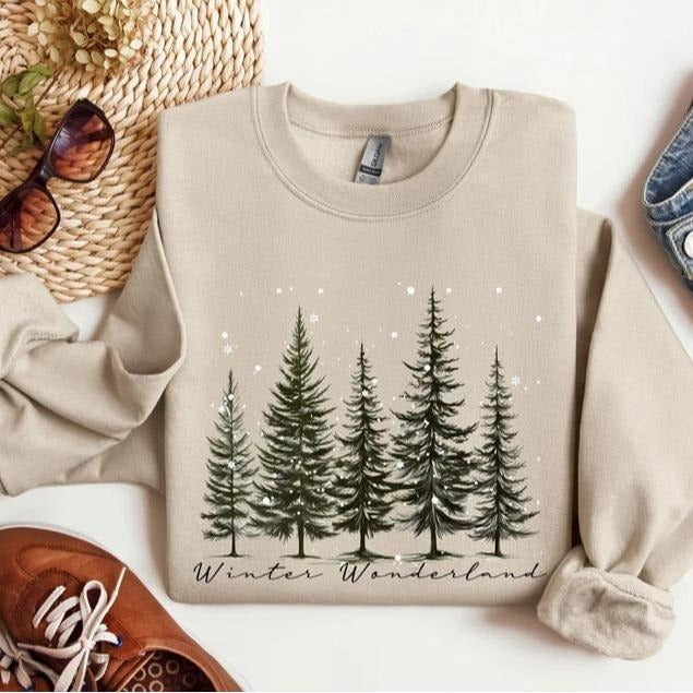 Cozy Winter Wonderland sweatshirt, a festive Christmas shirt for women and families. Perfect winter crew tee for holiday...