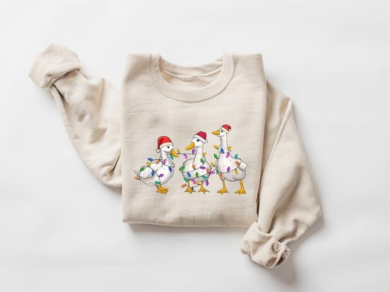 Duck Christmas Sweatshirt, Christmas Ducks Shirt, Christmas Gifts, Funny Christmas Duck Sweatshirt, Christmas Lights,...