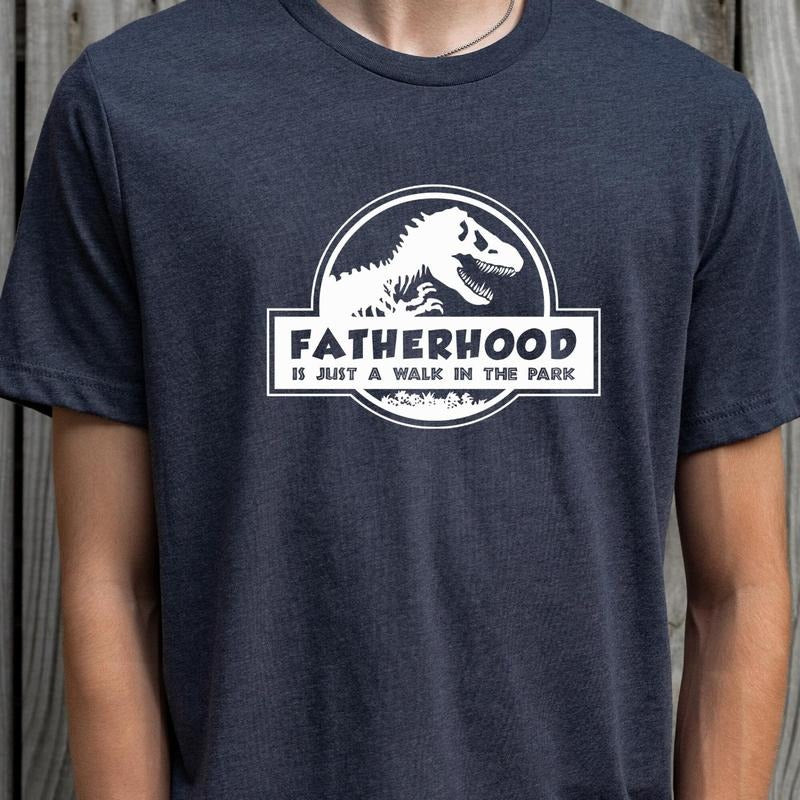 Fatherhood TShirtDino Dad TeeFatherhood Adventure Tee Hoodie, Sweatshirt | HypeDripTees.com