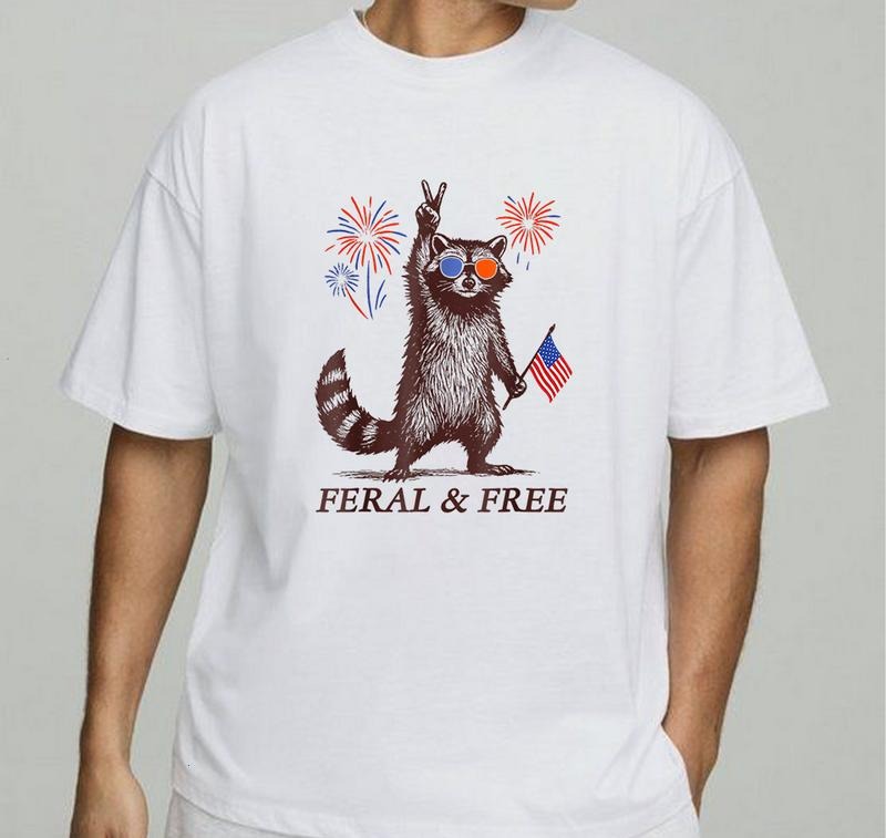 Feral & Free Funny Patriotic Racoon Feral And Free 4th July T-Shirt - T-Shirt Everyday Graphic Tee Sustainable Cotton...
