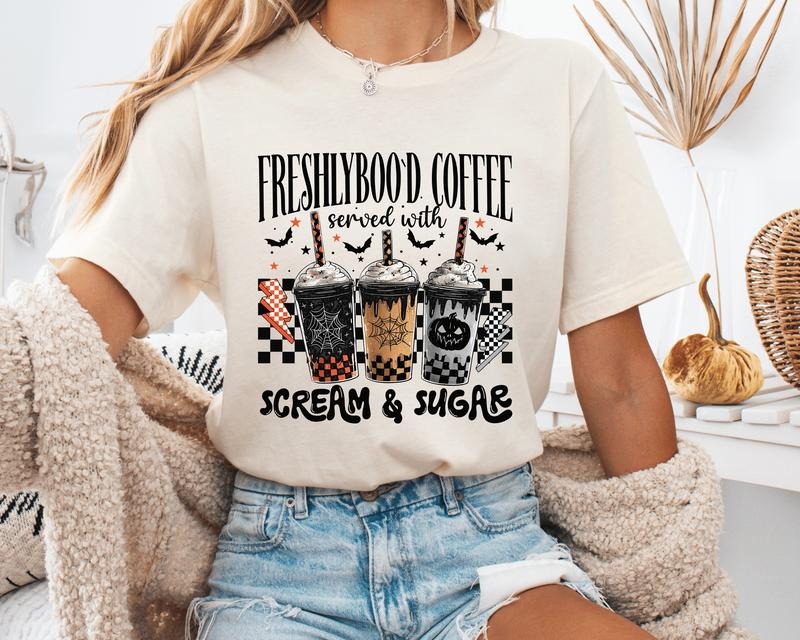 FreshlyBoo'd Coffee Halloween Unisex T-Shirt, Graphic Tees for Women & Men, Oversized Cotton Tees with "Scream & Sugar"...
