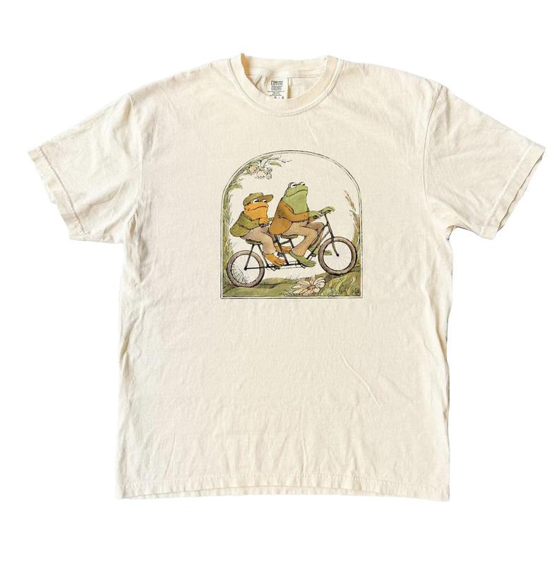 Frog Riding Bike 90s T-Shirt, Vintage Toad Graphic Shirt, Retro Book Lovers Shirt, Cute Frog Gift, Funny Classic Shirt...