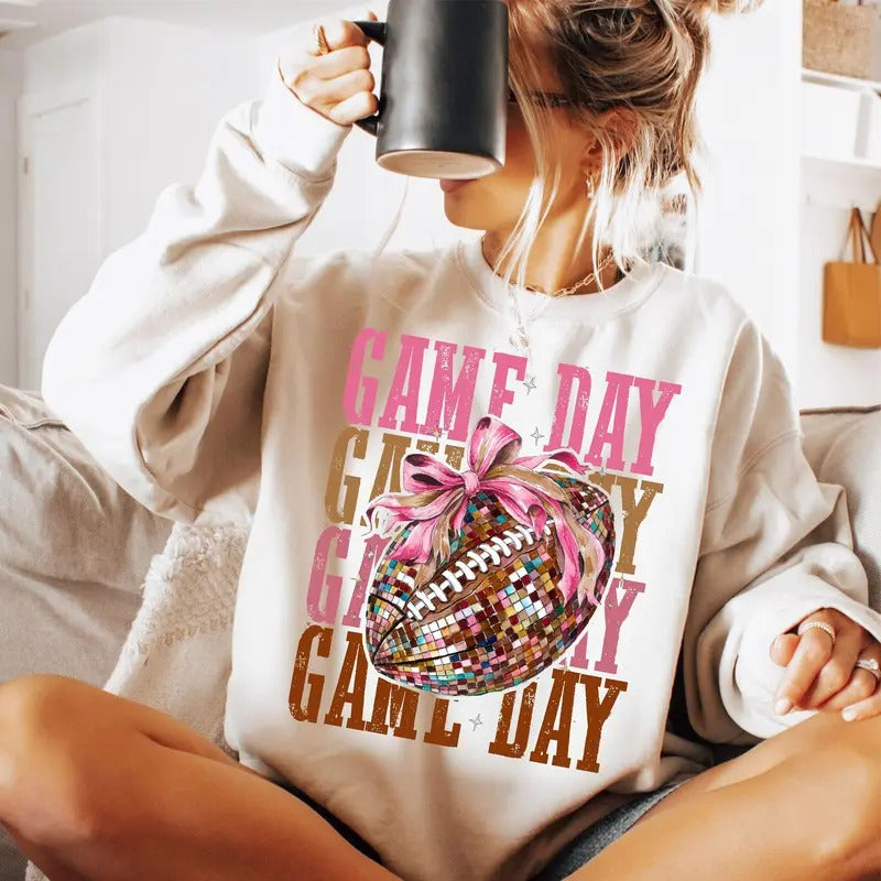 Game Day Coquette Football Sweatshirt, Football Bow Shirt, Game Day Shirt, Coquette Tee, Unisex Classic Cotton Graphic...