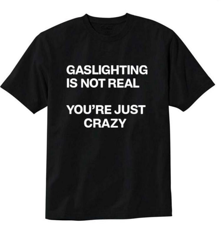 Gaslighting Isn't Real T-shirt Menswear Top Menswear Top Hoodie, Sweatshirt | HypeDripTees.com