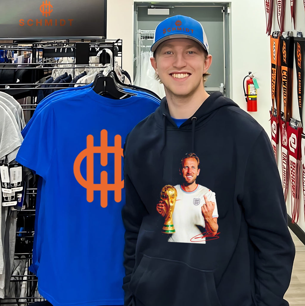 Harry Kane England national football team holding trophy middle finger shirt