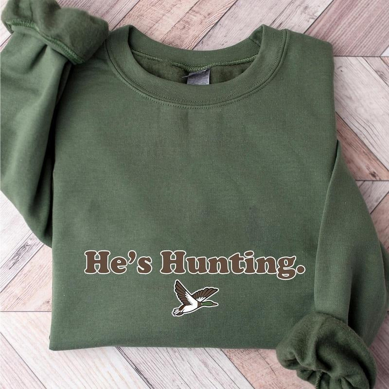 He is Hunting Mallard Duck Sweatshirt, Minimalist Graphic Sweatshirt Unisex, Retro Hunting Season Sweatshirt, shirt 2024...