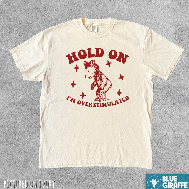 Hold On I'm Overstimulated Funny T Shirt, Cute Comfort Colors T-Shirt Menswear Top Hoodie, Sweatshirt | HypeDripTees.com