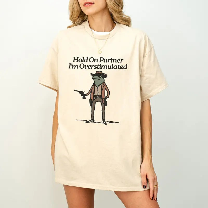 Hold On Partner Im Overstimulated Shirt, Cowboy Frog Shirt, Funny meme shirt Hoodie, Sweatshirt | HypeDripTees.com