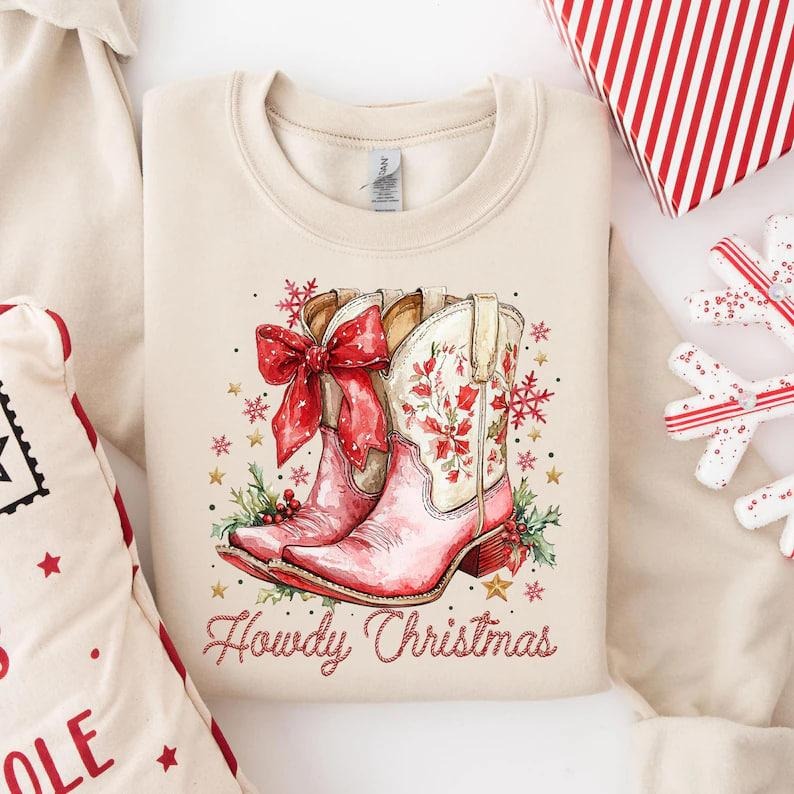 Howdy Christmas Sweatshirt, Cowgirl Boots Holiday Sweater, Coquette Cowgirl Pullover, Western Christmas Shirt for Women,...