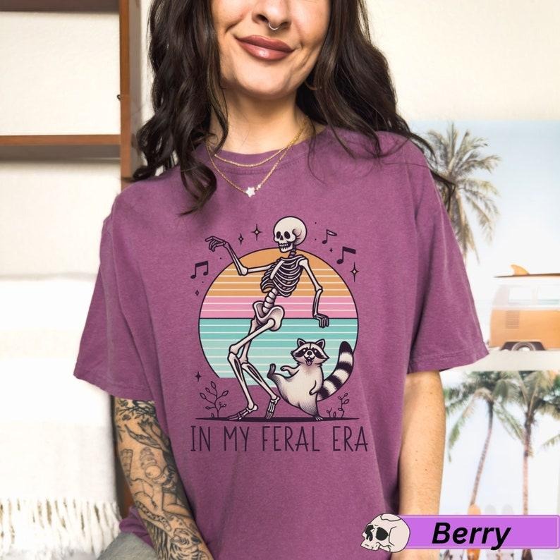 In My Feral Era Racoon and skeleton T Shirt Hoodie Sweater, In My Feral Era T-Shirt, Racoon and Skeleton Dancing Tshirt,...