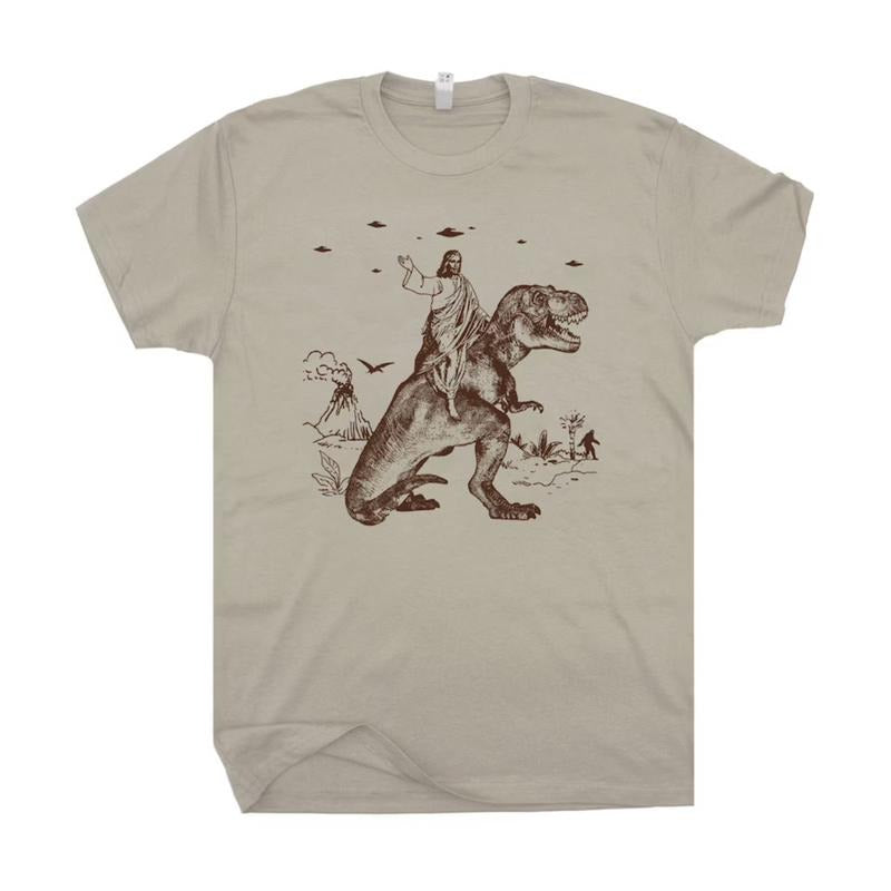 Jesus Riding Dinosaur T-Shirt, Funny T-Shirts Sweatshirt, Gift for Women Hoodie | HypeDripTees.com