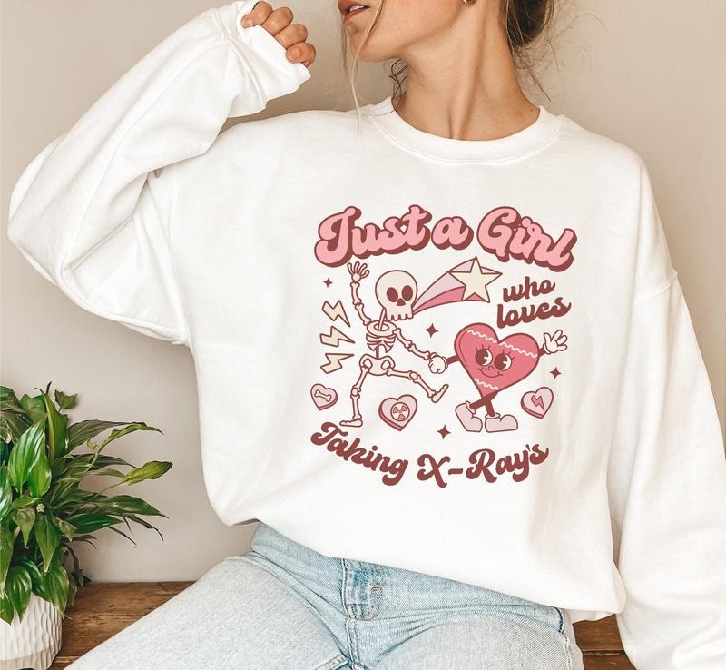 Just A Girl Who Loves X-Rays Sweatshirt, Skeleton Rad Tech Valentines Sweater Best Price T-Shirts, Hoodie | HypeDripTees.com