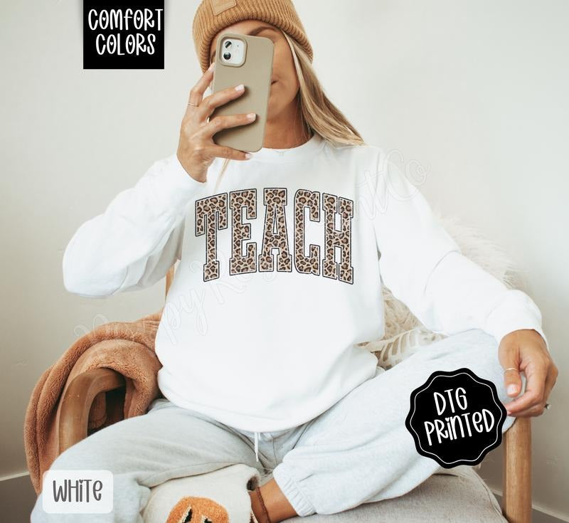 Leopard Teach Comfort Colors Sweatshirt, Trendy Women's Graphic Crewneck T-Shirts, Hoodie | HypeDripTees.com