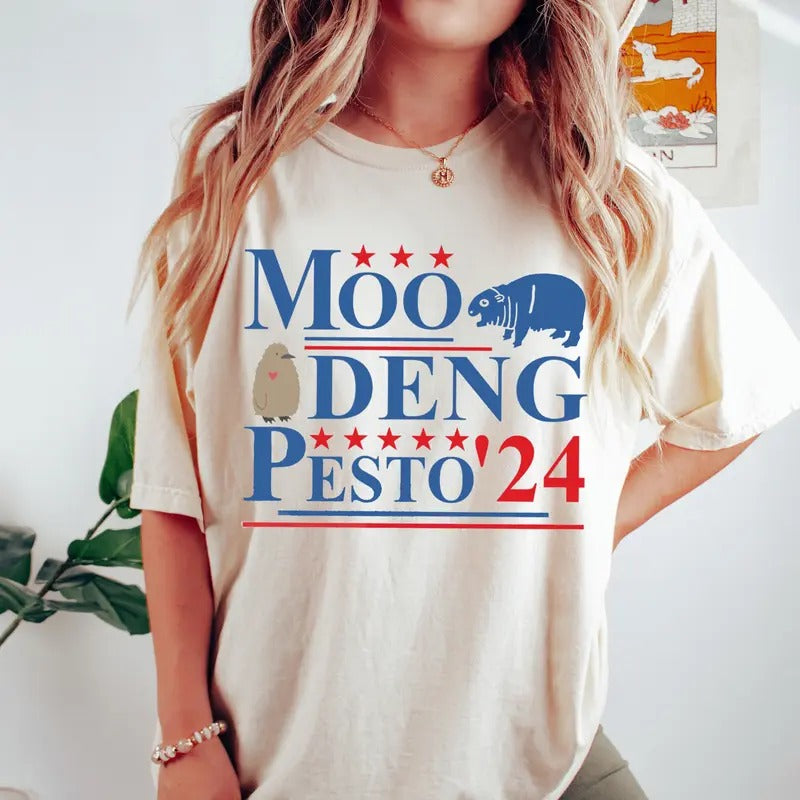 Moo Deng Pesto 2024 T Shirt, Funny Moo Deng Shirt, Baby Pesto Penguin Tshirt Hoodie, Sweatshirt | HypeDripTees.com
