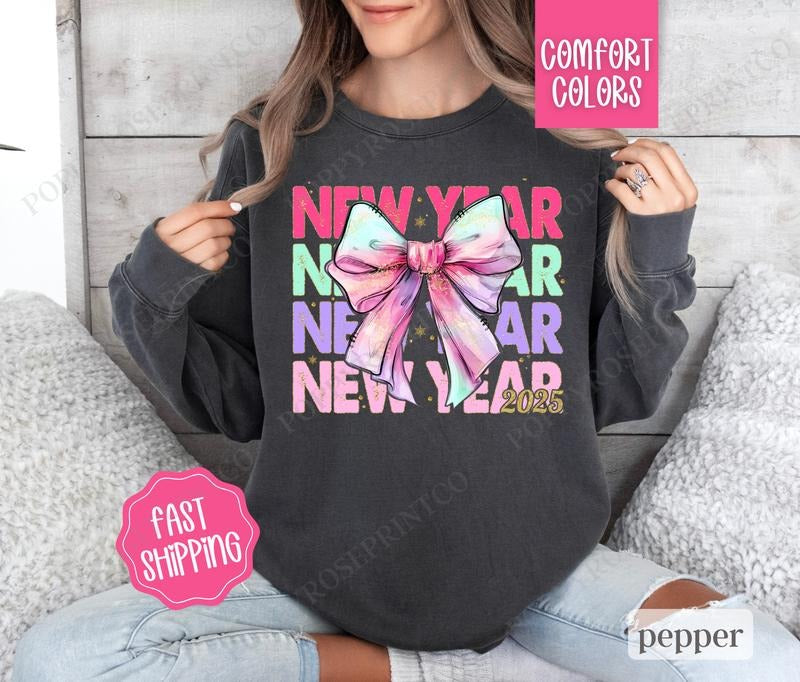 New Year Bow Sweatshirt Comfort Colors, NYE 2025 Crewneck, Happy New Year Sweater T-Shirts, Hoodie | HypeDripTees.com