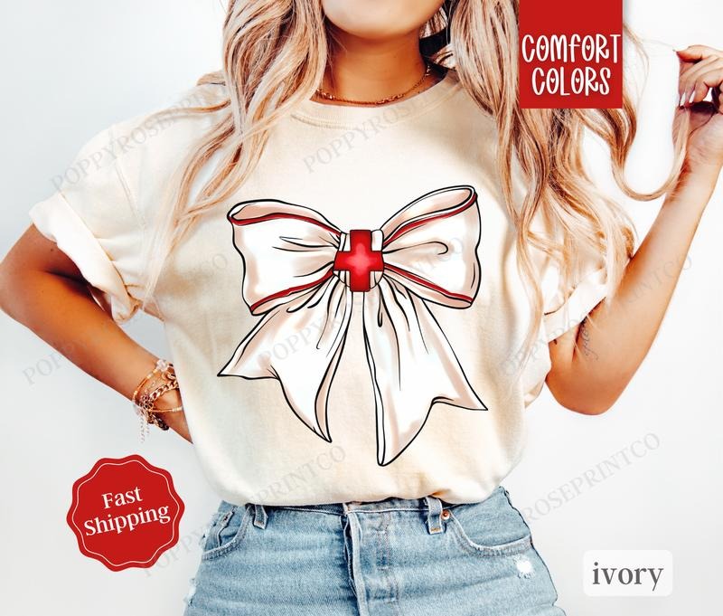 Nurse Bow Shirt Comfort Colors, RN Tshirt, Nursing Tee, Womenswear Oversized Crewneck Hoodie, Sweatshirt | HypeDripTees.com