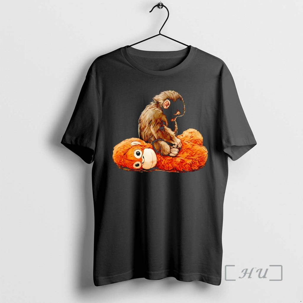 Officials Punch Monkey Stting On Plush Monkey Graphic