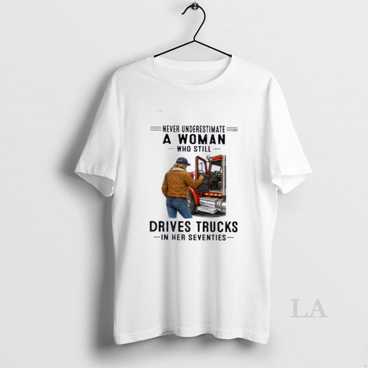 Original Never Underestimate A Woman Who Still Drives Trucks In Her Seventies T-Shirts, Hoodie, Sweatshirt | HypeDripTees.com