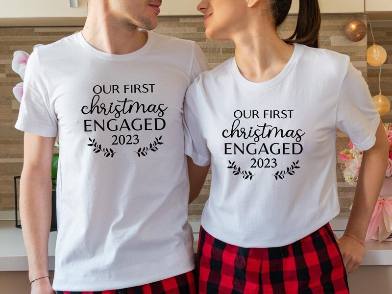 Our First Christmas Engaged 2023 Shirt, Matching New Engaged Couple Xmas T-Shirt, Engagement Gift Holiday Tee, Fiancé And...