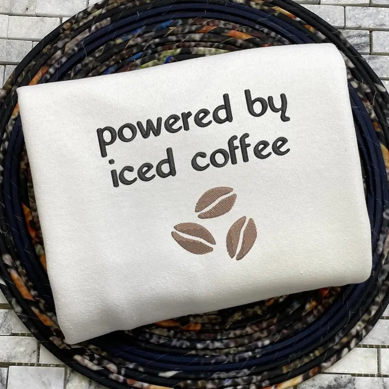 Powered by Iced Coffee Embroidered Sweatshirt, Coffee Beans Black and Cream Sweatshirt, Gift for Coffee Lover T-Shirts,...