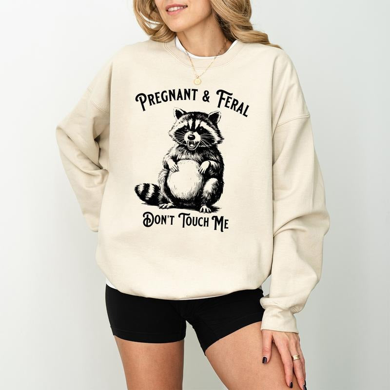 Pregnant & Feral Raccoon Shirt, Funny Maternity Graphic Tee, Sarcastic Mom to Be Gift, Quirky Pregnancy Humor Shirt For...