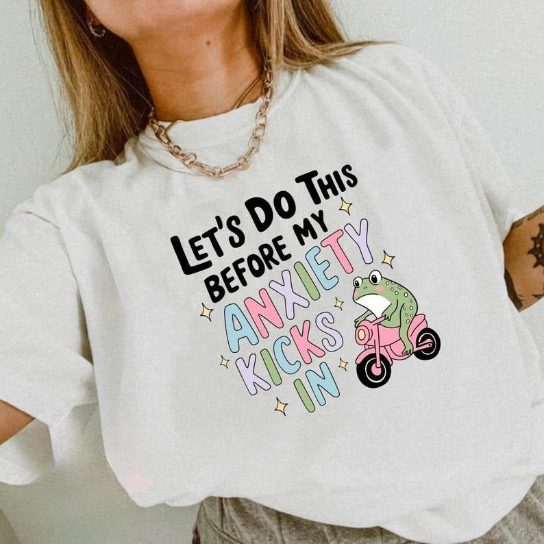 Relatable and Motivational T - Shirt: Confront Anxiety with the "LET'S DO THIS BEFORE MY ANXIETY KICKS IN" Design