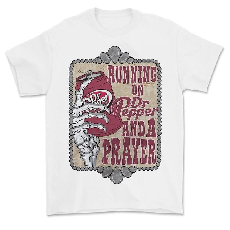 Running On Dr Pepper And A Prayer T-Shirt, Running on Prayer And Dr. Pepper T-Shirt Hoodie, Sweatshirt | HypeDripTees.com