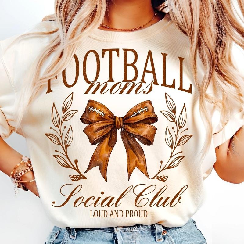 [Sale To 45% Off] Football Mom Social Club T-Shirt, Coquette Bow Retro Watercolor Football T-Shirt, Game Day Sidelines...