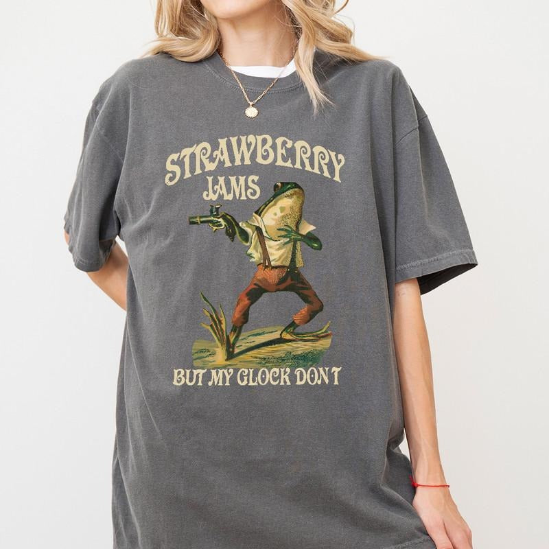 Strawberry Jams But My Glock Don't Shirt , Funny Frog Shirt, Funny Meme Shirt LS838 Hoodie, Sweatshirt | HypeDripTees.com