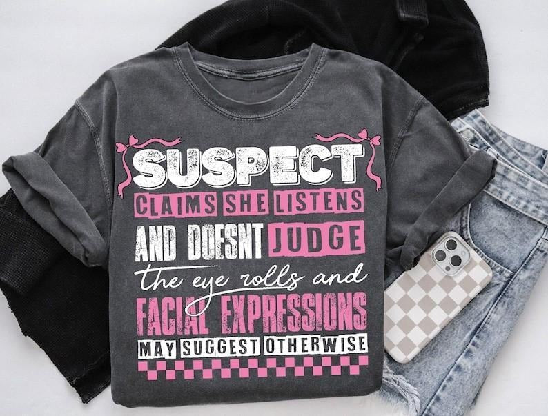 Suspect Claims She Listens And Doesnt Judge Tshirt, Suspect Trendy Shirt, Trending Tee Top Womenswear Hoodie, Sweatshirt