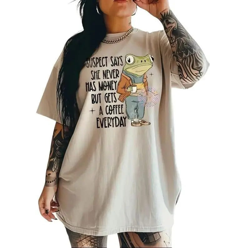 Suspect Says She Never Has Money But Gets a Coffee Everyday Shirt, Gift For Woman and Man Unisex T-Shirt Casual Clothing...