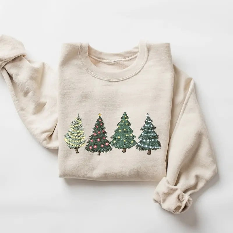 Sweatshirt with four festive Christmas trees, each uniquely decorated with colorful holiday lights. Cozy and cheerful for...
