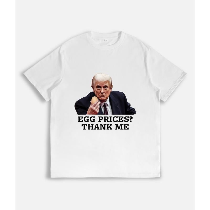 T - Shirt with "EGG PRICES? THANK ME" Slogan and Figure Image Hoodie, Sweatshirt | HypeDripTees.com
