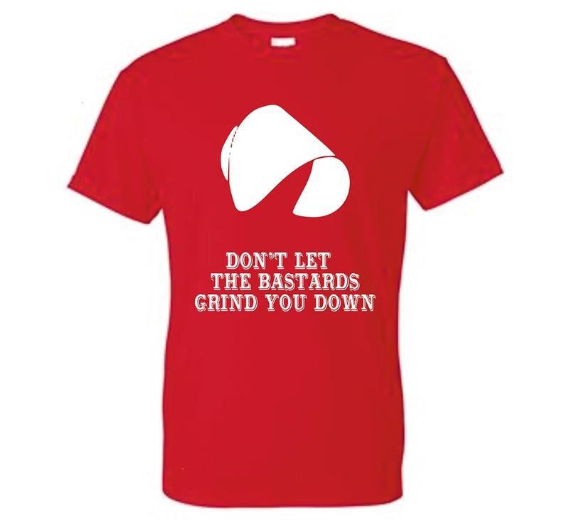 The Handmaid's Tale Don't Let The Bastards Grind You Down Unisex T-Shirt Hoodie, Sweatshirt | HypeDripTees.com