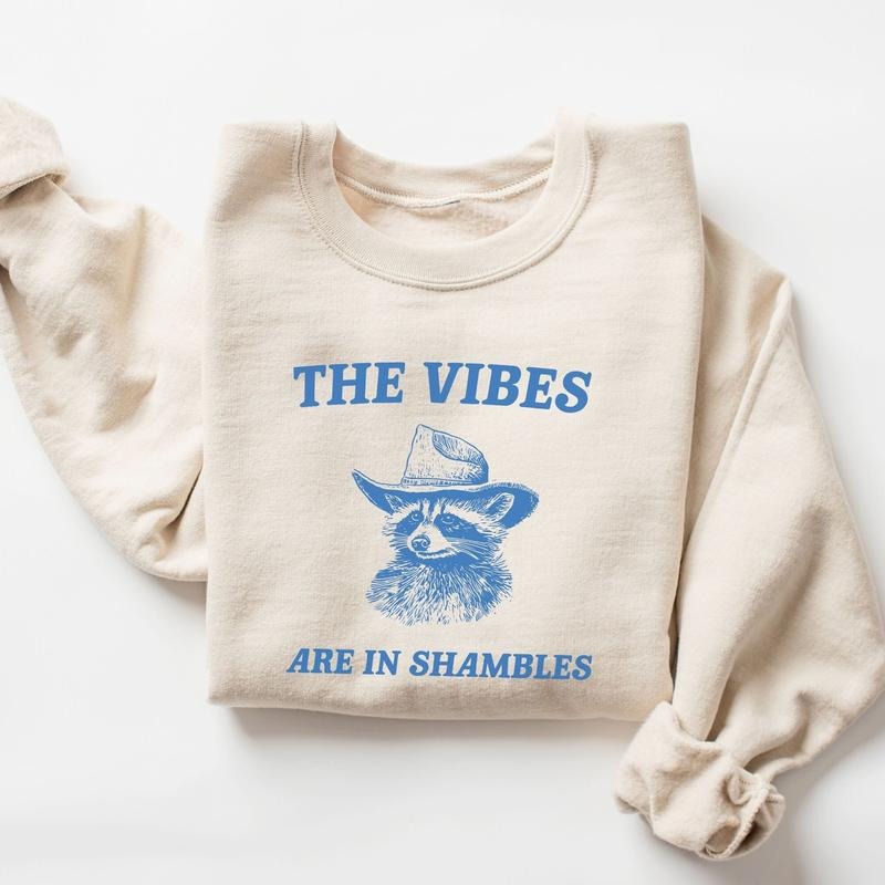 The Vibes Are In Shambles Sweatshirt, Racoon Meme shirt, Racoon Moon howling Shirt Hoodie | HypeDripTees.com