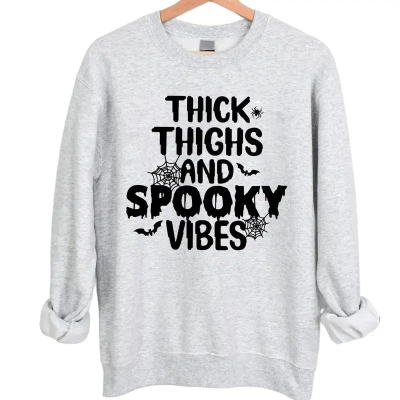 Thick Thighs and Spooky Vibes Halloween Crewneck Sweatshirt Hoodie Tshirt, Halloween 2024 Gifts | HypeDripTees.com