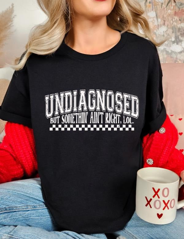 Undiagnosed but something ain't right funny casual softstyle unisex t-shirt Hoodie, Sweatshirt | HypeDripTees.com