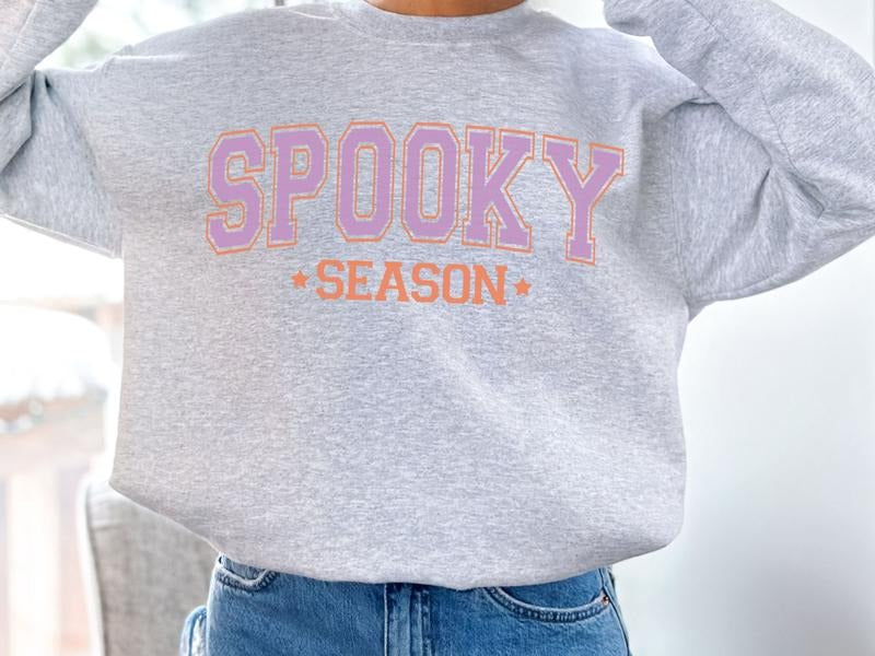 Varsity - Style Spooky Season Sweatshirt in Ash T-Shirts, Hoodie | HypeDripTees.com