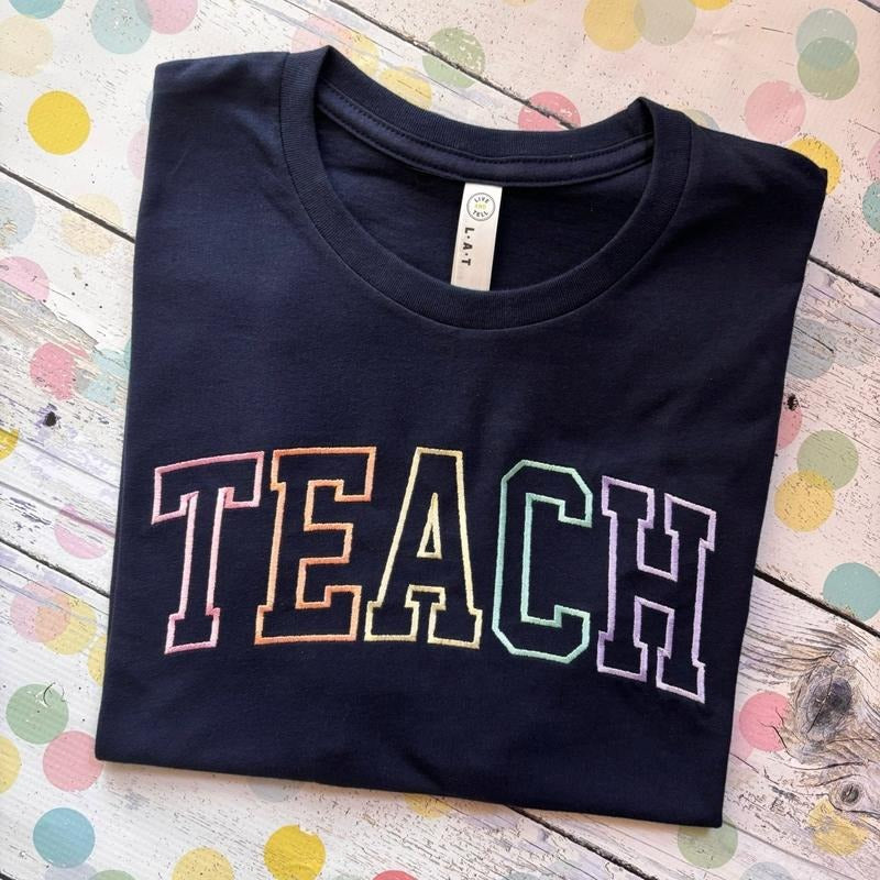Varsity Teach Tee Teacher Shirt Navy Pastel Hoodie, Sweatshirt | HypeDripTees.com