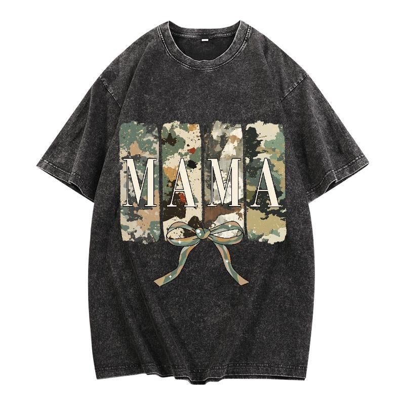 Washed T - Shirt Featuring "MAMA" in Camo - style Graphics with Bow: A Trendy and Heart