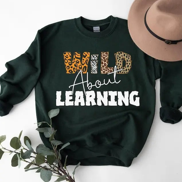 Wild About Learning At School Shirt, 2024 Funny First Day Of School Shirt, Teacher Love Inspire Tshirt Fabric Casual...