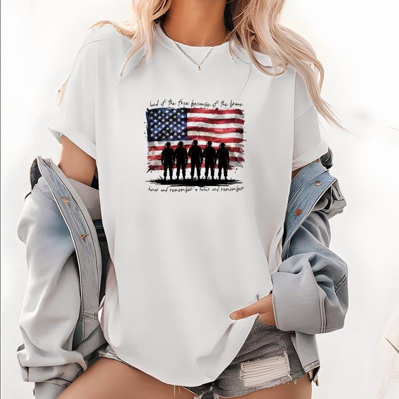 Women's T - Shirt Honoring Military Heroes: "land of the free because of the brave" Slogan with American Flag and Soldier...