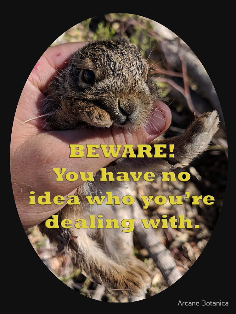 Trapped Rabbit "Beware - You have no idea who you're dealing with" caption by Arcane Botanica