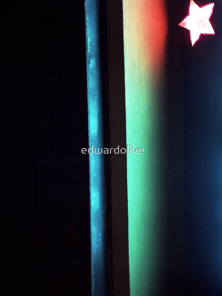 Abstract dark photo of star and lines on blackness silver gelatin color 35mm negative analog film photo by edwardolive