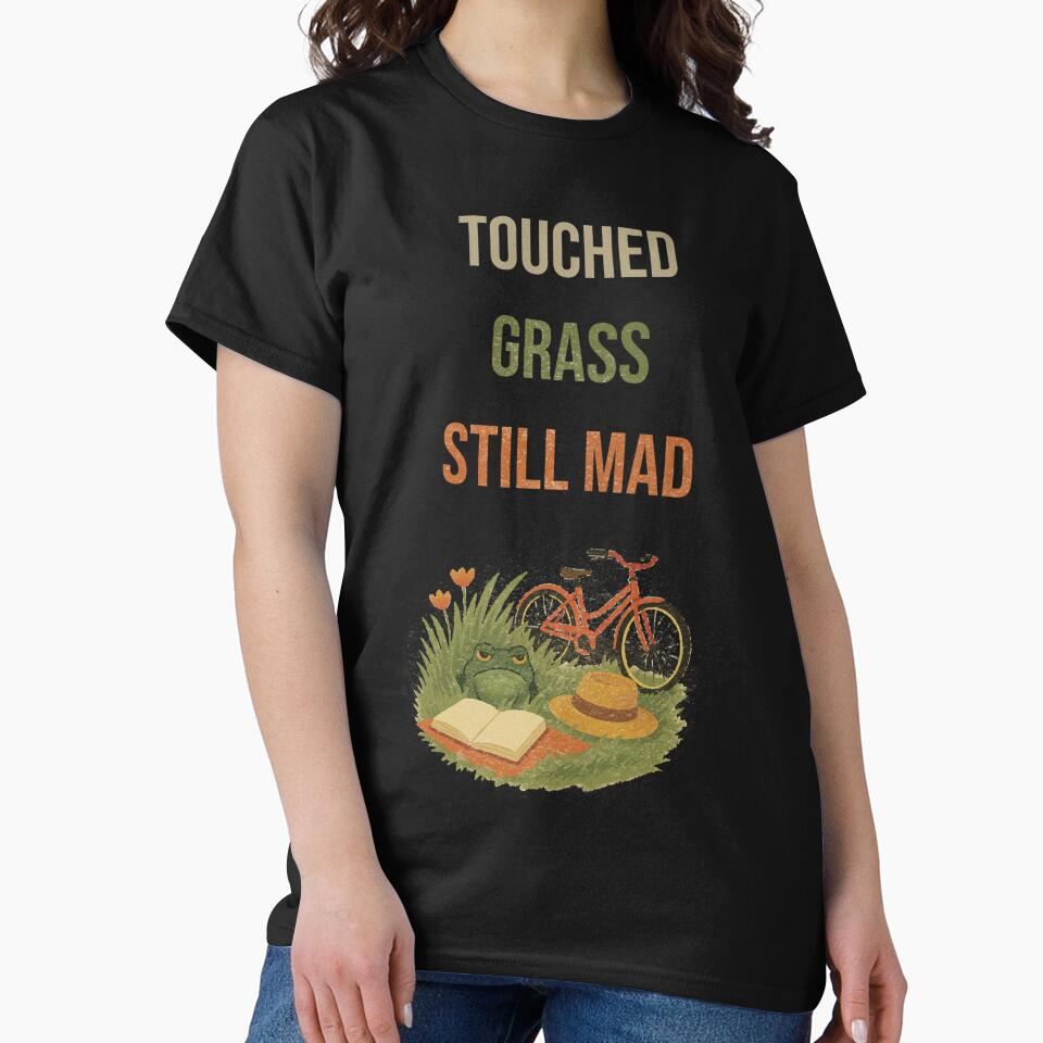 Touched Grass Still Mad – Grumpy Frog Picnic Design with Bike and Book by InkRevolt